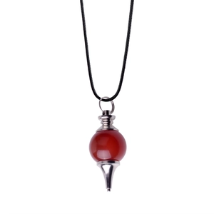 Red spherical crystal pendulum pendant with silver metal caps on a black cord necklace