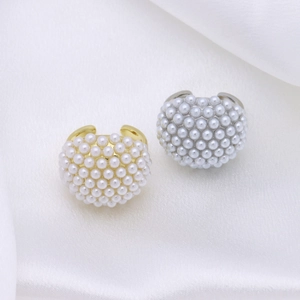 Elegant adjustable open rings with white faux pearls in gold and silver finish settings