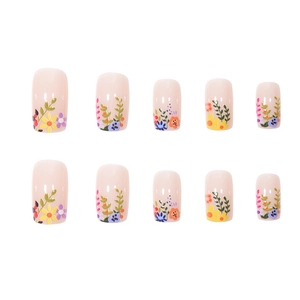 Floral press-on nails in soft pink with colorful summer flower digital print patterns