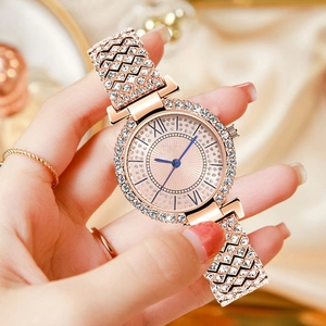 Luxury rose gold women watch with diamond-encrusted dial and chain strap on satin