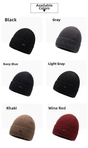 Detail view of winter knit beanies in six colors with metallic mountain logo patches