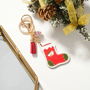 Christmas bear stocking keychain with colorful star glass ball and festive gold ring