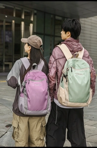 Outdoor shot of large capacity nylon backpacks in purple and light green colors