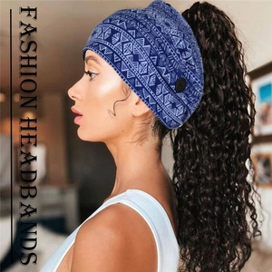 Blue bohemian paisley yoga headband with side buttons for masks on a model