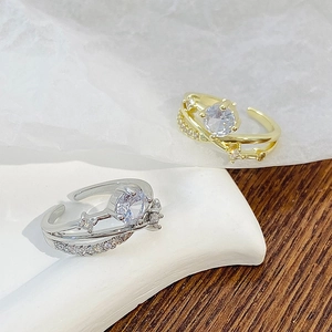 Adjustable celestial ring with sparkling zircon star motifs and crossed bands