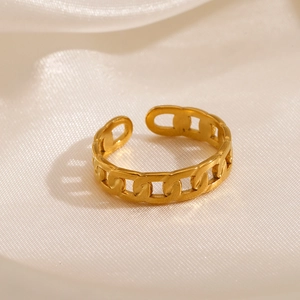 Gold plated stainless steel Cuban chain link open ring on cream silk background