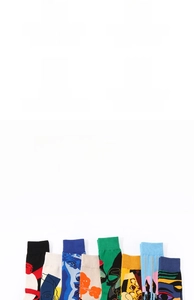Detail of artistic cotton socks showing breathable knit and abstract face patterns