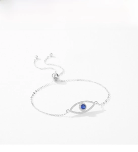 Detail of s925 silver Evil Eye bracelet with blue crystal and adjustable slider clasp