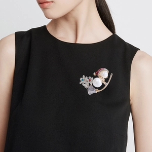 Cute Christmas pearl snowman brooch with red hat on black sweater for holiday gift