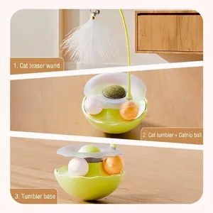 3-in-1 cat toy with feather wand, track balls and catnip in a green tumbler design