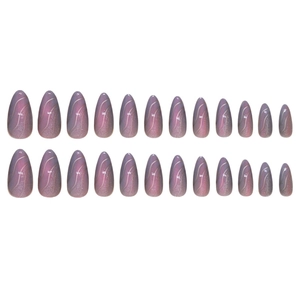 Cat eye press-on nails in purple gradient with almond shape and wavy line accents