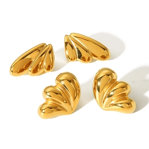 Gold chunky wing teardrop earrings with polished mirror finish in a minimalist style