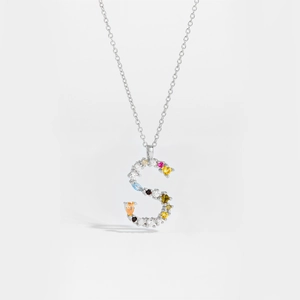 Close-up of S925 sterling silver letter S pendant necklace with colorful zircon stones