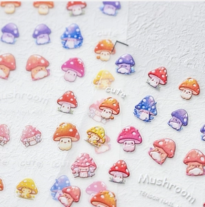 Detailed macro view of 3D embossed cute mushroom nail art stickers with relief textures