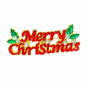 Detail of Christmas tree brooch with Merry Christmas text and colorful enamel inlay