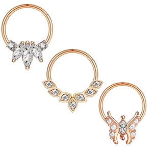 Detail of rose gold nose ring set featuring marquise zircon and flower designs