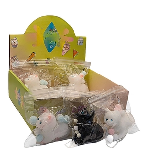 Detail of the colorful Pinch Family box containing squishy cat stress relief toys in bags
