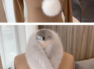 Close-up of fluffy white faux fur pom-pom and soft plush grey scarf collar detail