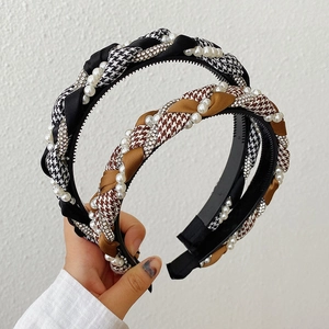 Braided houndstooth headbands in black and brown with pearl and rhinestone accents