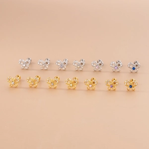 Minimalist stainless steel butterfly zircon stud earrings set in silver and gold tones