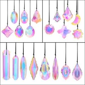 Detailed grid of geometric AB color crystal suncatcher pendants with rainbow coating