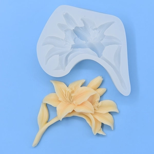 3D Lily flower silicone mold for DIY cake baking and candle making on blue background
