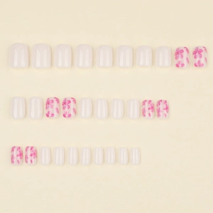 Short square press-on nails set with creamy white and pink floral designs, 26 pieces
