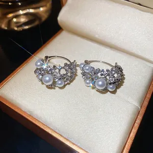 Elegant silver star hollow hoop earrings with white pearls and sparkling rhinestones