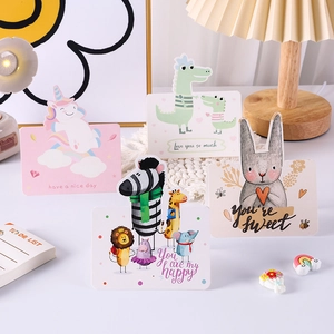 Set of four cute cartoon animal greeting cards with unicorn and rabbit illustrations