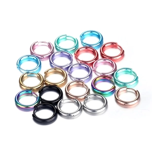 Set of round stainless steel hoop earrings in gold, silver, black and multi-color finishes