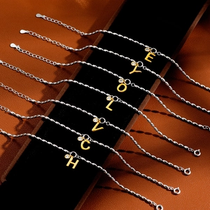 Elegant S925 silver chain bracelets with gold initial pendants and zircon accents