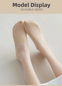 Close-up of nude invisible low cut boat socks with seamless edge on foot
