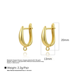 Macro detail of 18k gold plated copper U-shaped earring hooks for DIY jewelry making