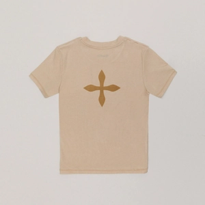 Detail of cross flower print on back of beige cotton t-shirt with soft texture