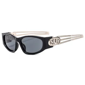Futuristic Y2K sunglasses with black frames and silver hollowed metal temples with NUK logo
