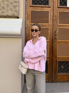 Women's pink cable-knit sweater with lapel collar in a loose casual autumn street style