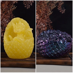 Detailed close-up of dragon egg molds showing intricate scales and hatching dragon textures