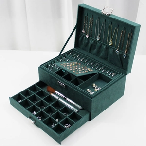 Three-layer dark green velvet jewelry box with lock and multiple storage compartments