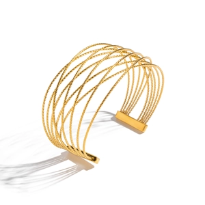 Minimalist wide mesh gold cuff bracelet with twisted rope texture and hollow layered design