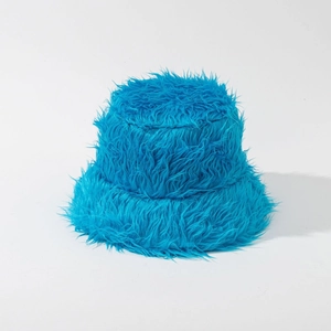 Plush faux fur bucket hat in bright blue, warm winter headwear with a fluffy texture