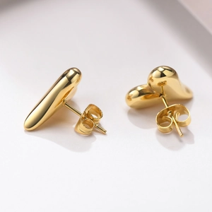 Elegant gold heart-shaped titanium steel stud earrings with a polished metallic finish