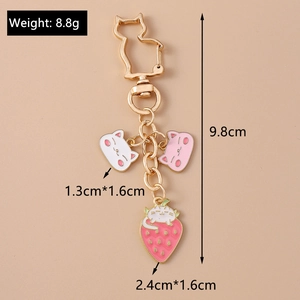 Detailed size chart for pink and white enamel cat keychain with strawberry charm