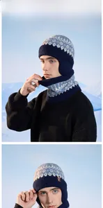 Detail of navy knit hat and neck warmer set with Nordic pattern on a male model