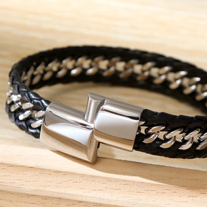 Macro detail of men's Cuban chain bracelet with black woven leather and steel clasp