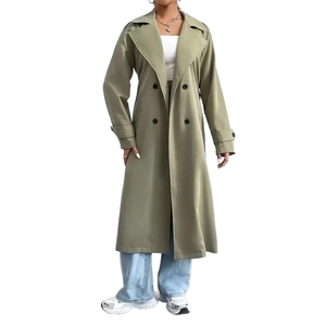Detail view of double-breasted trench coat with wide lapels and belted sleeve cuffs