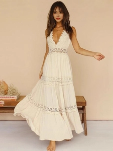 Elegant bohemian cream white lace dress with deep V-neck and tiered crochet details