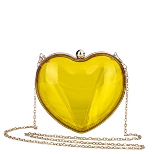 Elegant yellow transparent acrylic heart-shaped clutch bag with golden metal chain strap