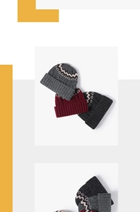 Detail of Nordic jacquard knitted beanie with wide ribbed cuff and grey burgundy pattern