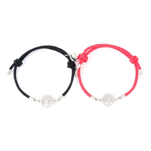 Detail of tree of life magnetic heart bracelets with adjustable braided ropes