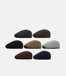Collection of wool flat caps in seven colors including grey, brown, black, and khaki